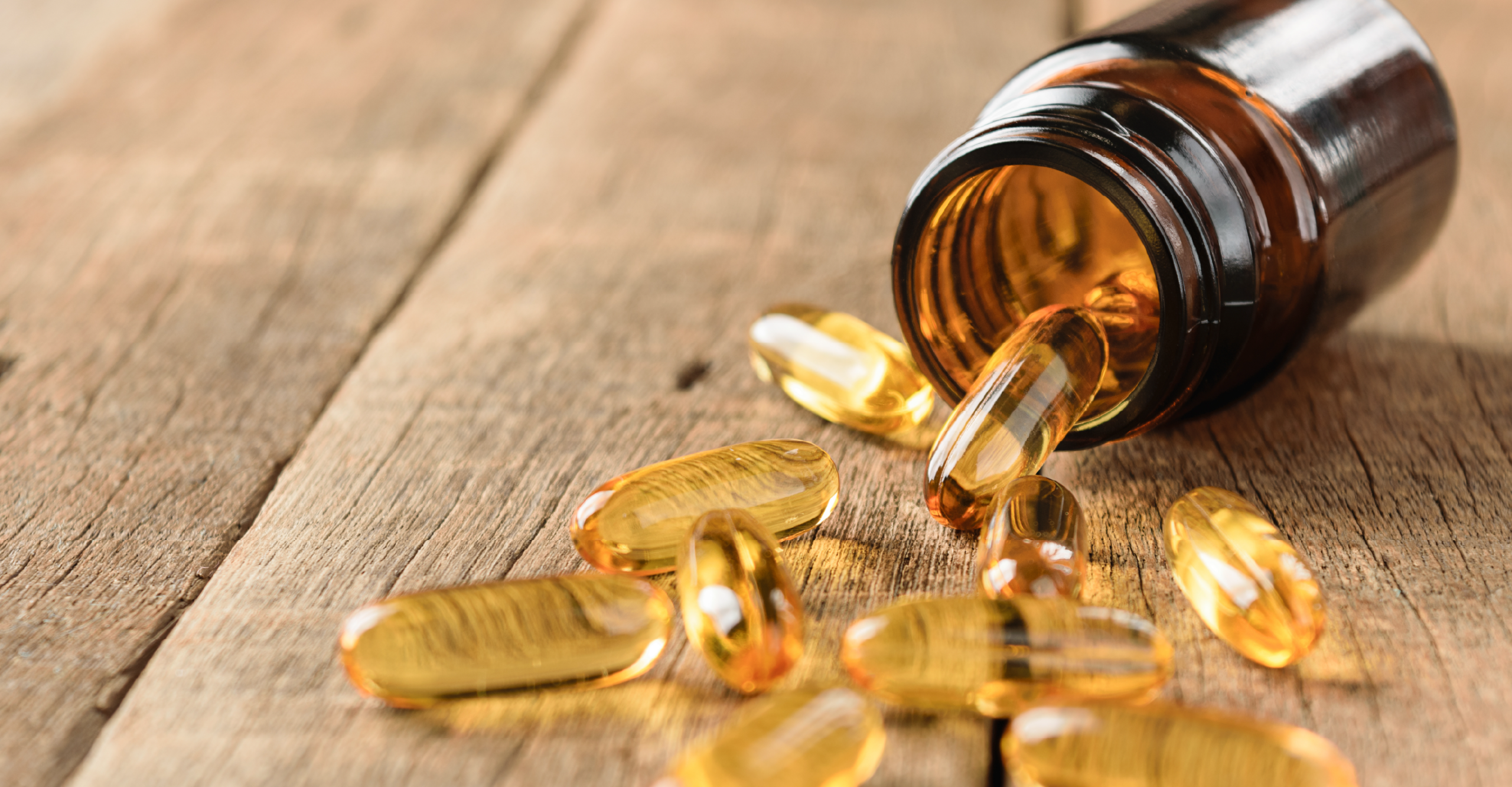 vitamins coming out of a bottle