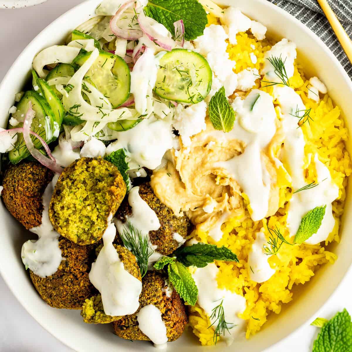Vibrant Falafel Bowls with Turmeric Rice prepared for meal prep