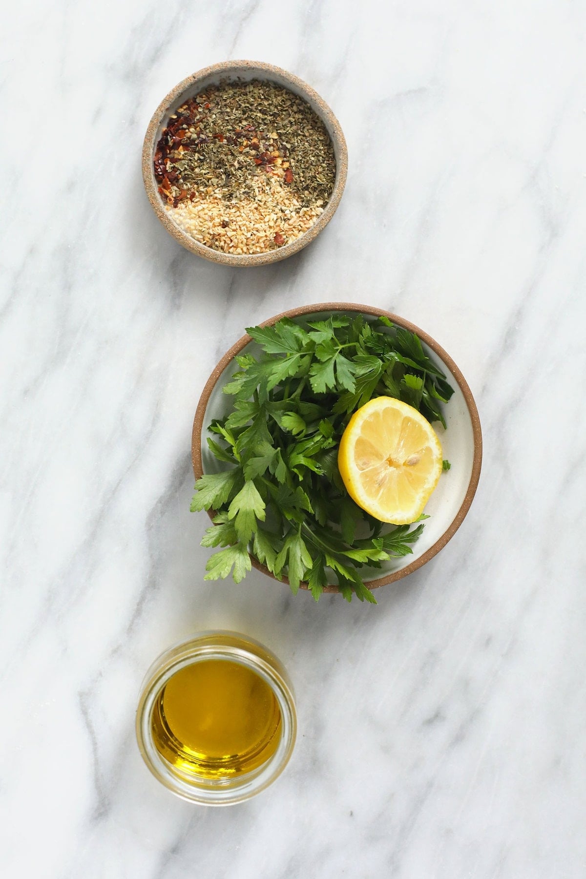 This is the best homemade Italian dressing chicken marinade you'll find on the internet. It will leave your chicken juicy, tender, and flavorful. ingredients on countertop.