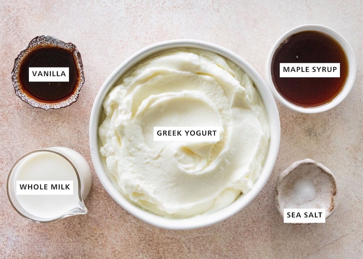 Ingredients for the greek yogurt ice cream: greek yogurt, whole milk, vanilla, maple syrup and salt.